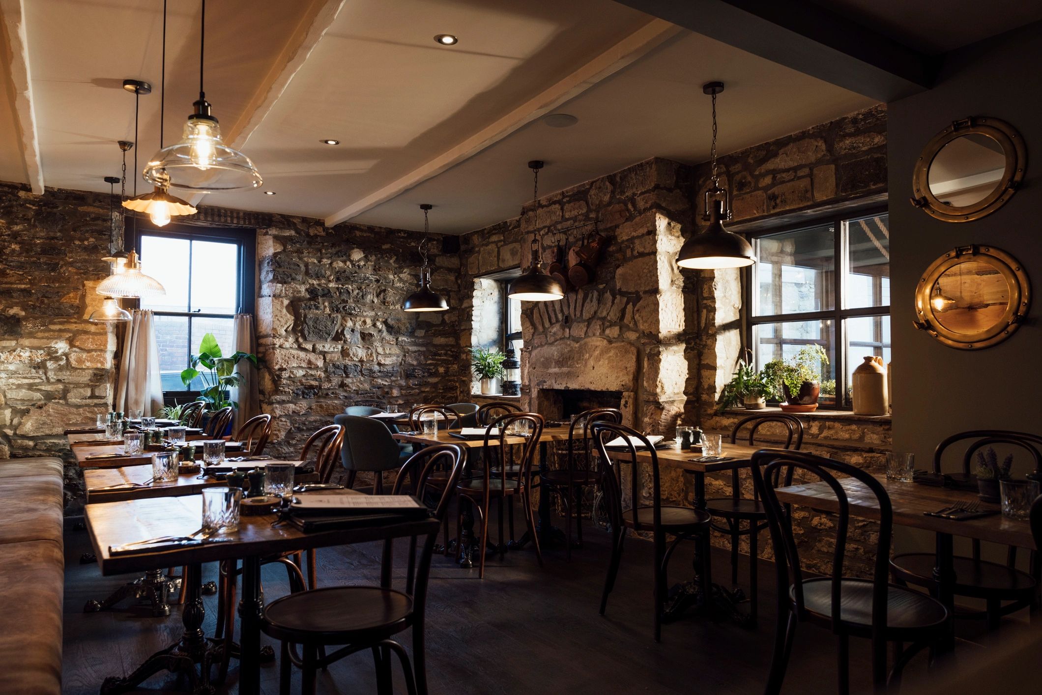 Rustic restaurant interior with table settings