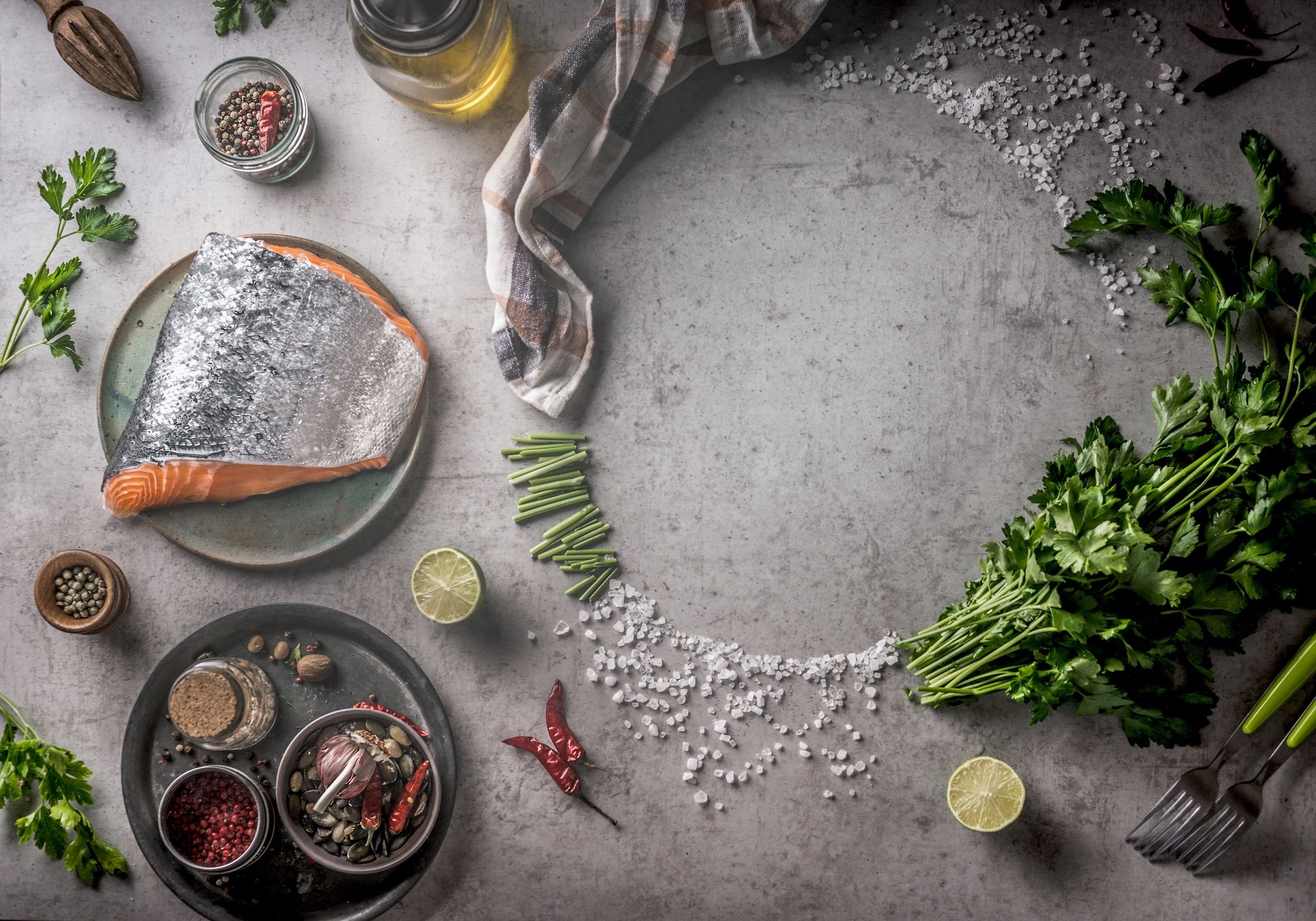 Flat lay of fresh ingredients and spices arranged for cooking preparation