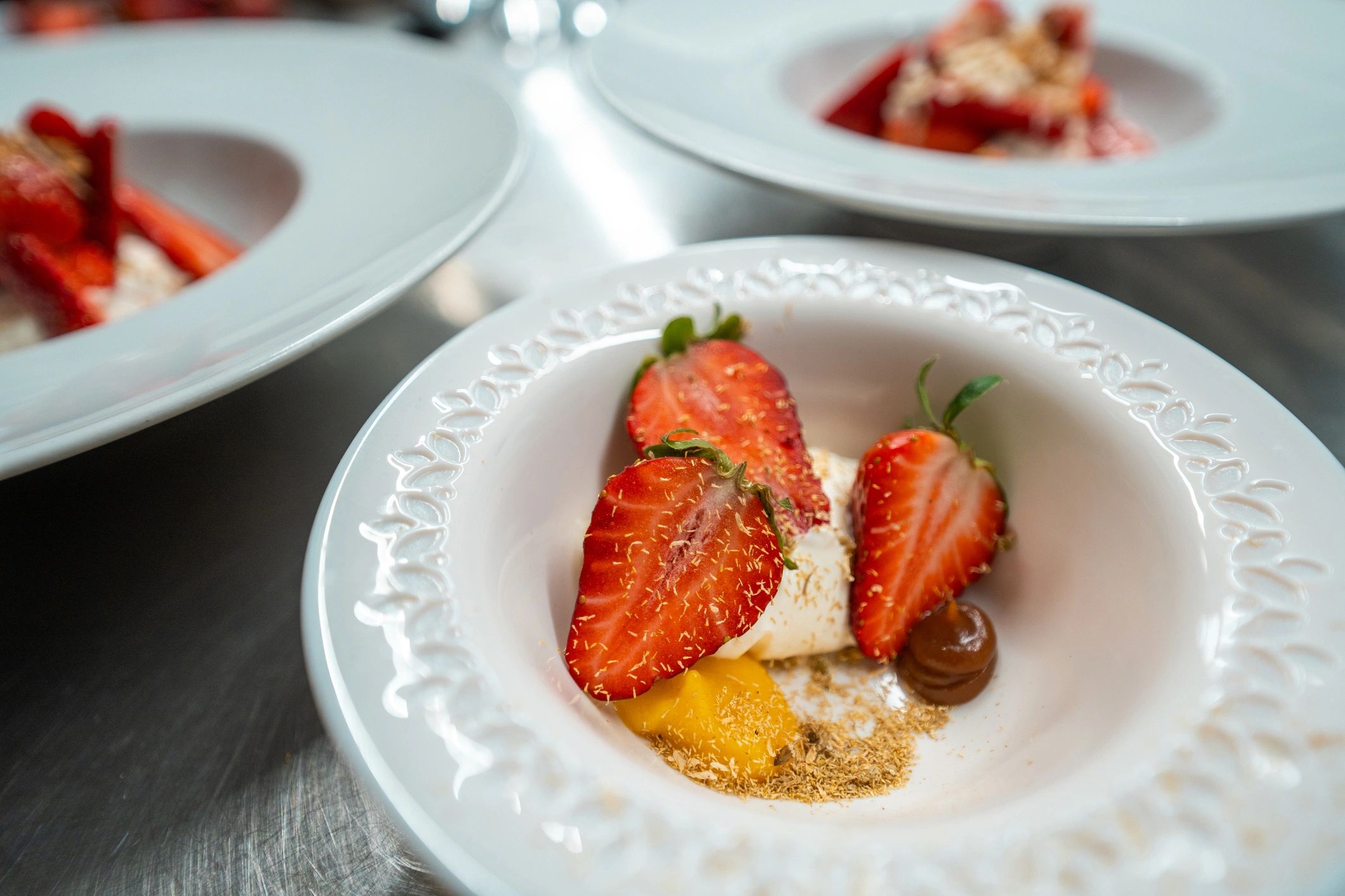 Fresh strawberry dessert plated with delicate garnish